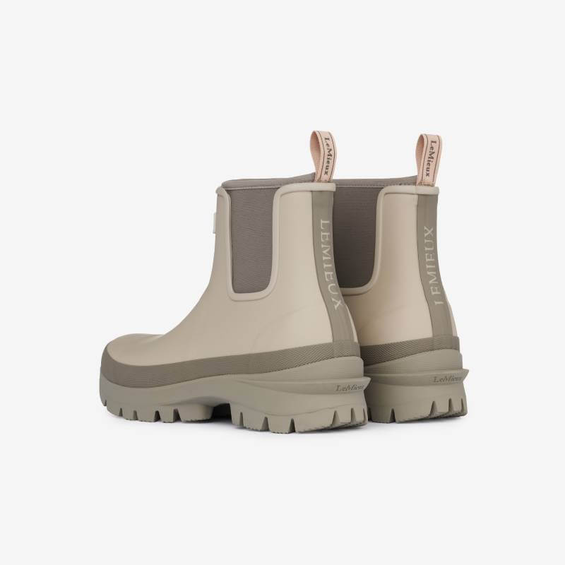 LeMieux Bramshaw Chelsea Welly Stone boots with pull tabs and rugged soles, shown from the back.