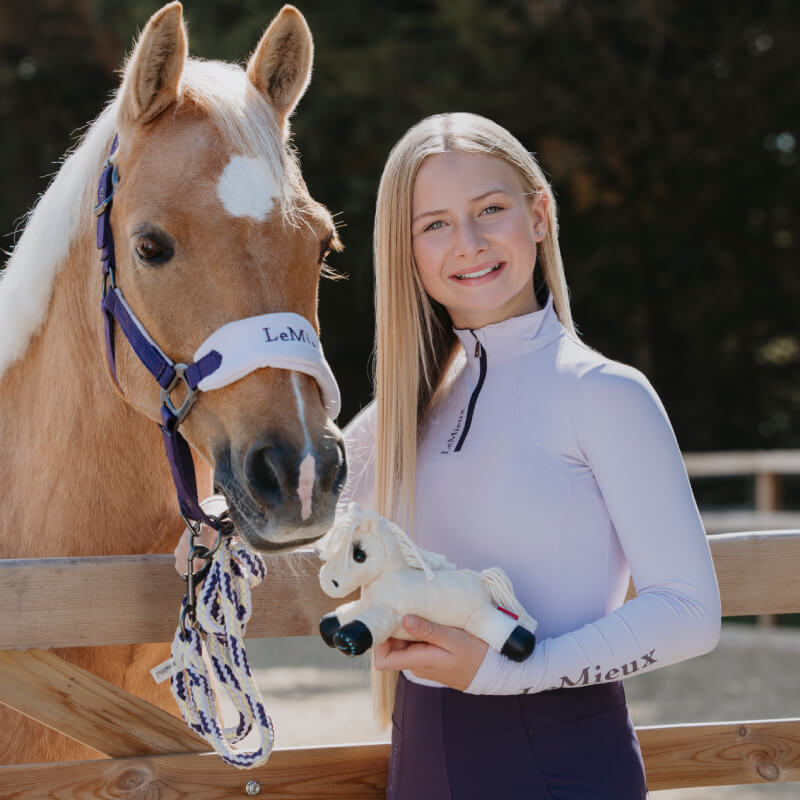 LeMieux Harlow Tiny Beanie Pony Popcorn: cream plush horse with black hooves and yarn mane.