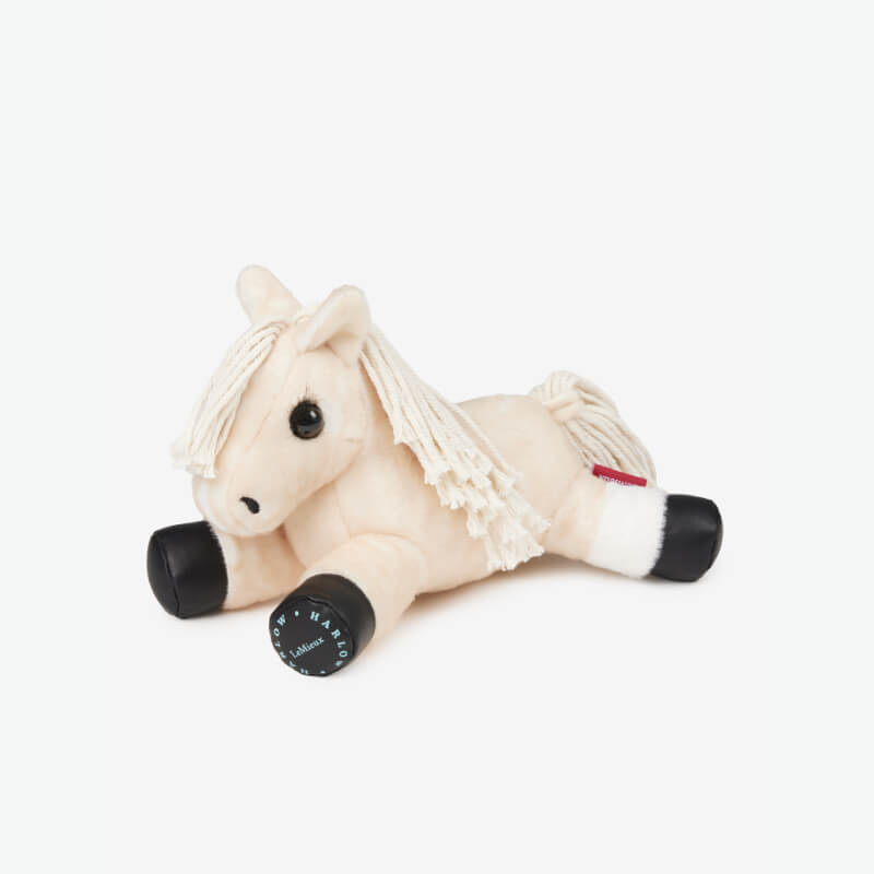 LeMieux Harlow Tiny Beanie Pony Popcorn: cream plush horse with black hooves and yarn mane.