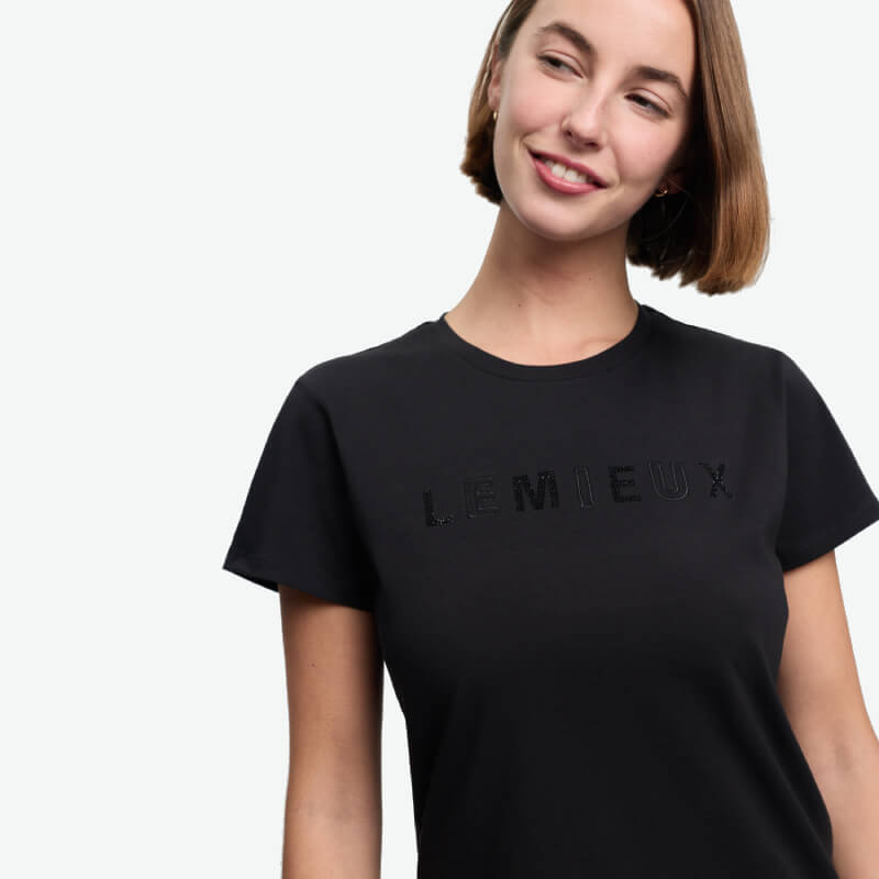 LeMieux Brilliance T-Shirt Black: short-sleeve, subtle chest text, moisture-wicking fabric.