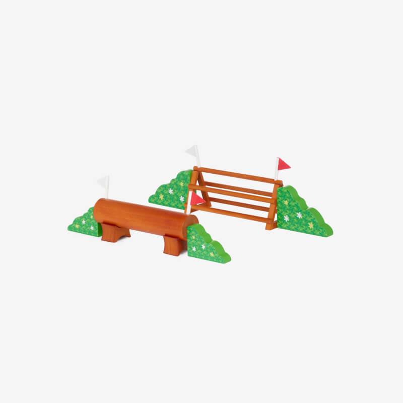 LeMieux Toy Pony XC Jump Set Multi with green bases and red and white flags.