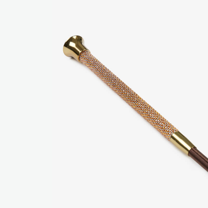 LeMieux Brilliance Schooling Whip Espresso: gold tip, beaded shaft—perfect for dressage.