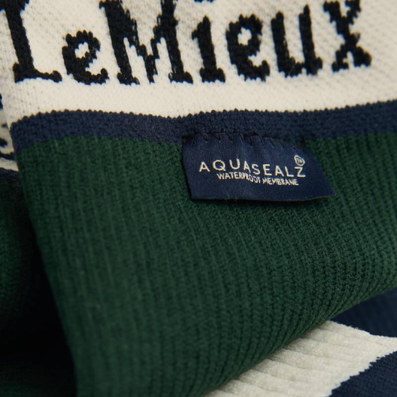 Close-up of LeMieux x Sealskinz Waterproof Socks Green with Aquasealz label on fabric.
