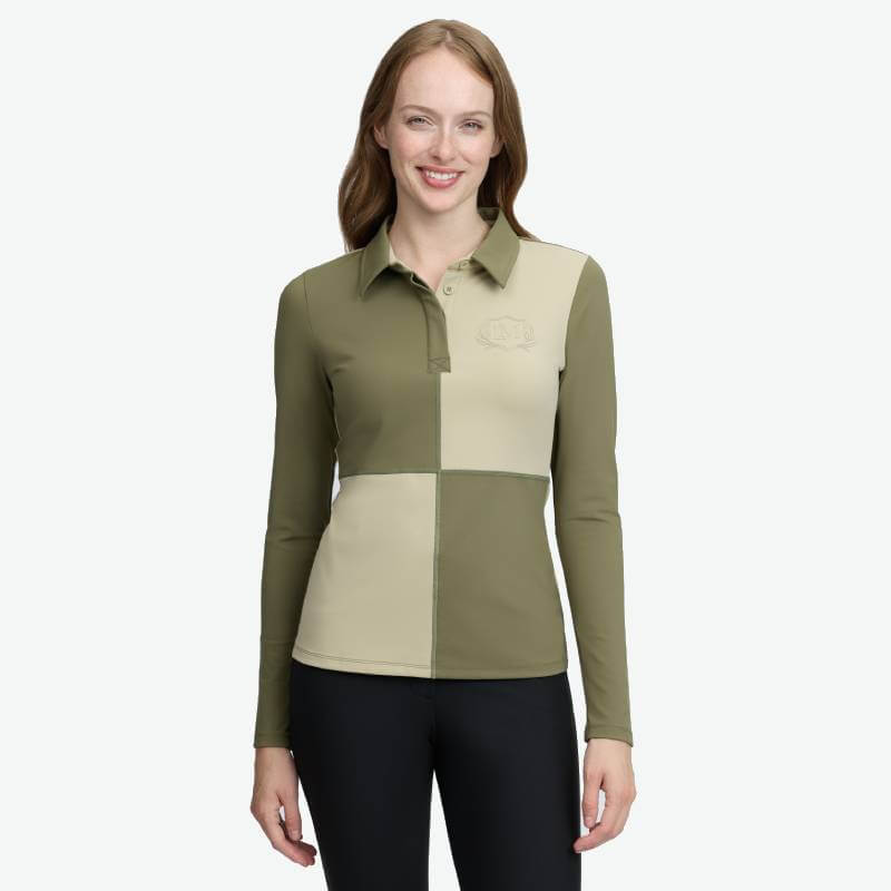Smiling woman in a LeMieux Harlequin Rugby Shirt Baselayer Willow/Pear.