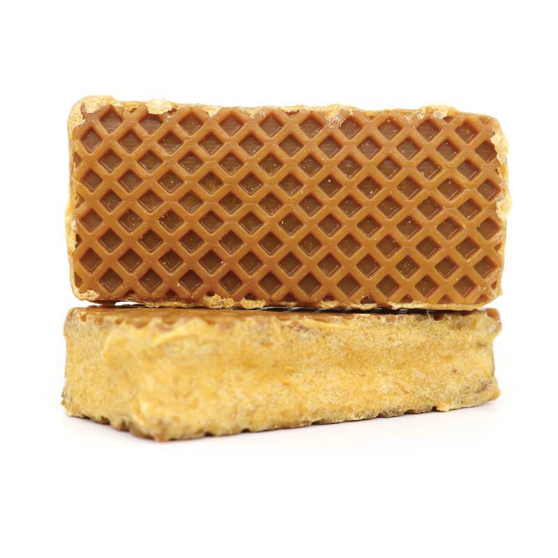 Two Healthy Paws Deli Paws Wafers stacked on white, ideal as healthy snacks for dogs.
