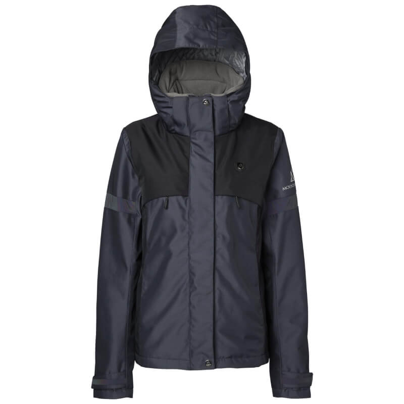 A woman wears a Mountain Horse Royal Grace Jacket Deep Purple, purple beanie, shirt, black pants.