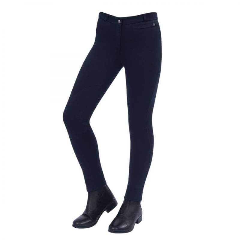 Person in Dublin Supa-Fit Zip Up Knee Patch Jodhpurs, navy, with black shoes, back view.