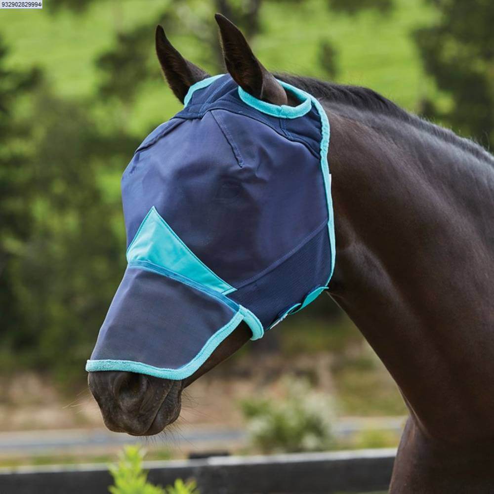 A horse wears a Weatherbeeta Comfitec Fine Mesh Mask With Nose over its face and muzzle.