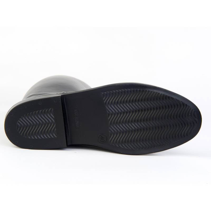 Dublin Universal Childs Tall Boots: black, waterproof, textured sole, shown bottom-up on white.