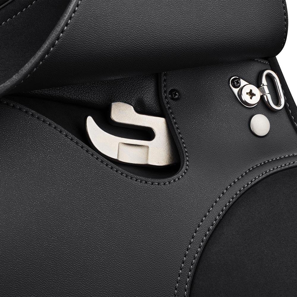 Close-up of a Wintec Pro Wide Dressage Hart Saddle with shiny metal clasp and hardware.