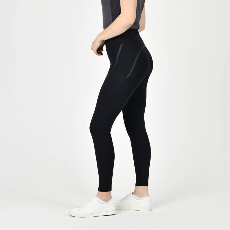 Wearing Weatherbeeta Toulon Lifestyle Tights Black, standing sideways against a plain background.