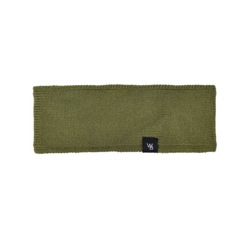 Woman with blonde ponytail wears Weatherbeeta Fleece Lined Ponytail Headband in Olive Night.