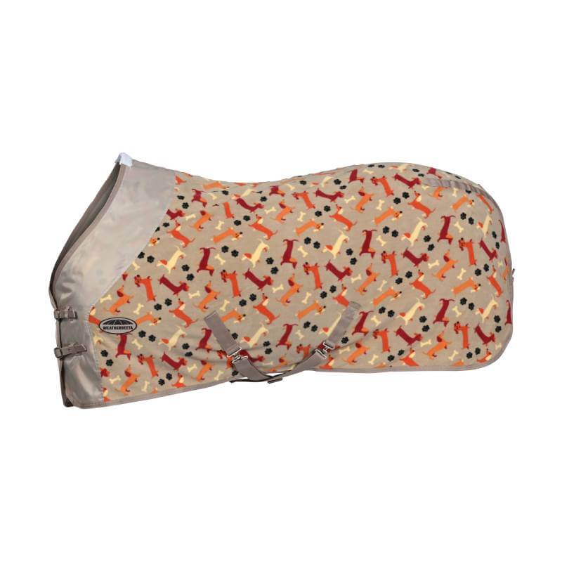 A horse in a Weatherbeeta Dachshund Print Fleece Cooler stands on a dirt path with fields behind.