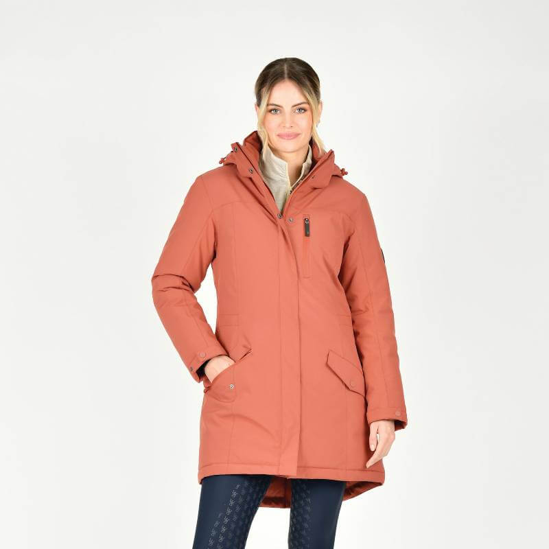 Woman in a Weatherbeeta Kyla II Redwood Waterproof Jacket smiling against a white background.