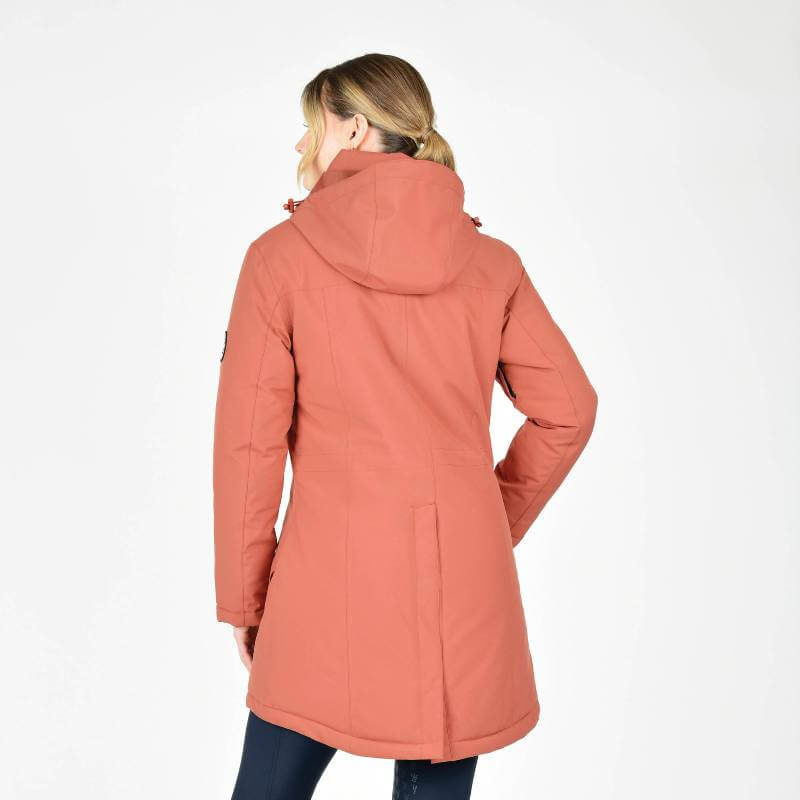 Woman wearing Weatherbeeta Kyla II Waterproof Jacket Redwood Ladies, back view on white.