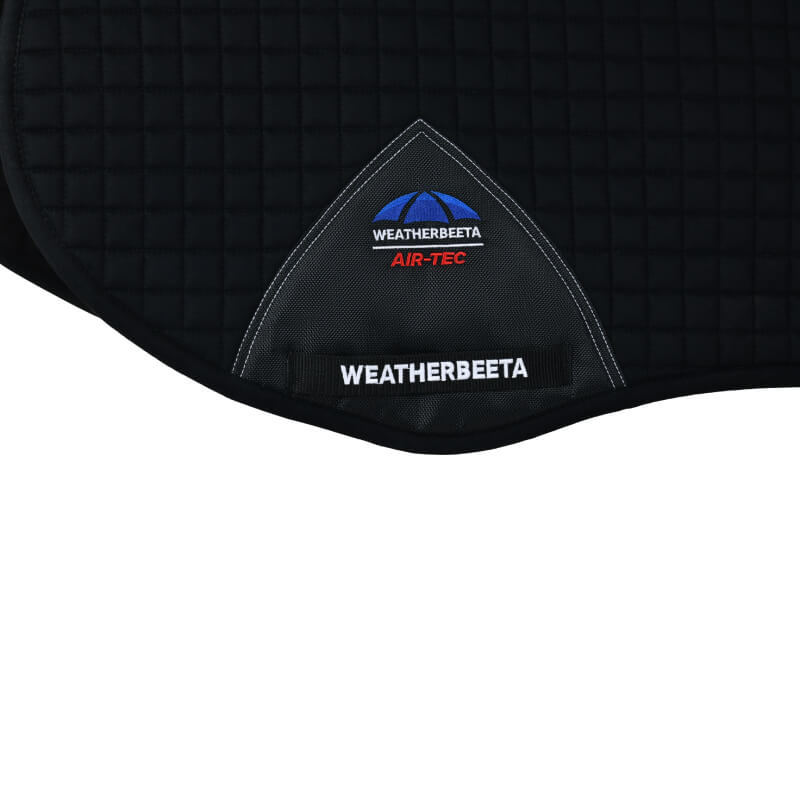 Close-up of the black Weatherbeeta Prime Air-Tec All Purpose Saddle Pad with branding.