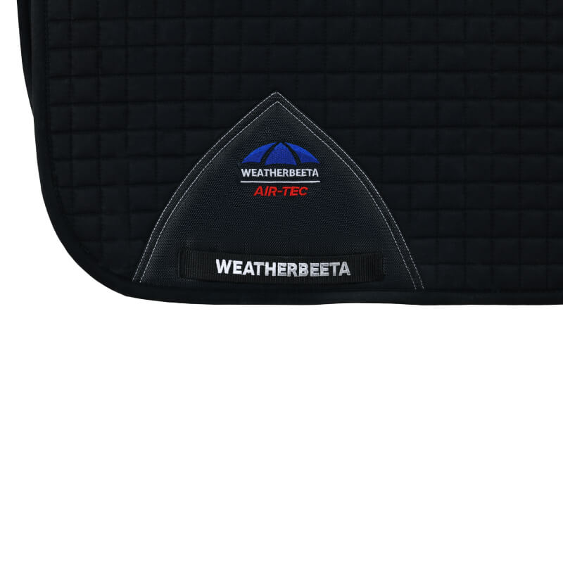 Black Weatherbeeta Prime Air-Tec Dressage saddle pad with corner logo.