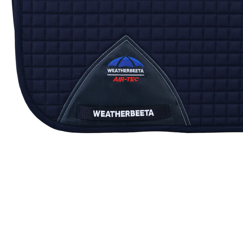 Weatherbeeta Prime Air-Tec Dressage Saddle Pad in navy with logo and label.