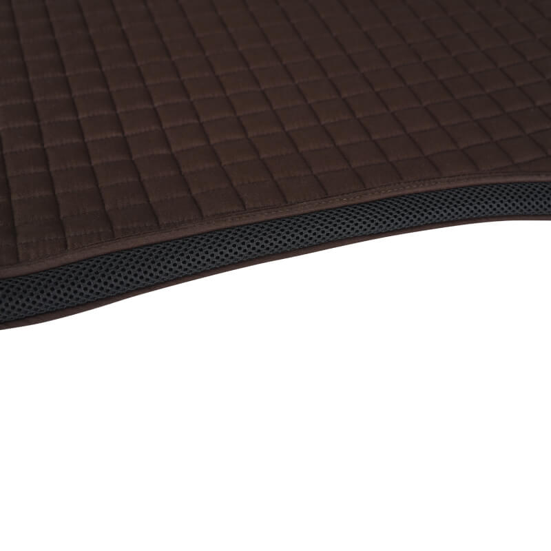 Close-up of a Weatherbeeta Prime Air-Tec Jump Shaped Saddle Pad Chocolate with mesh underside.