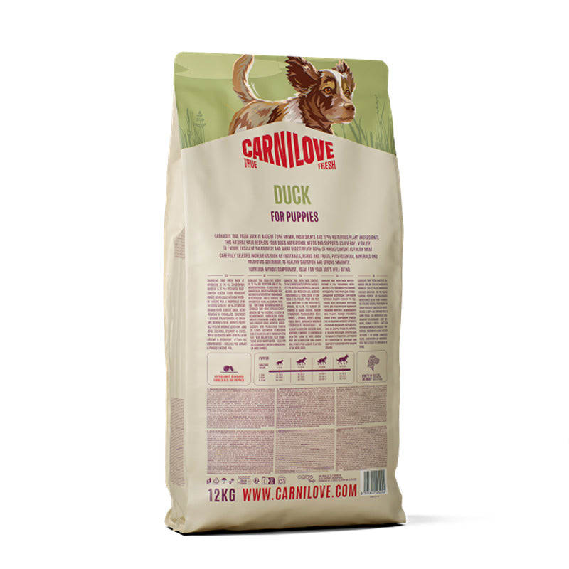 Carnilove True Fresh Duck Puppy Dog Food, 12kg, grain-free, with puppy illustration on bag.