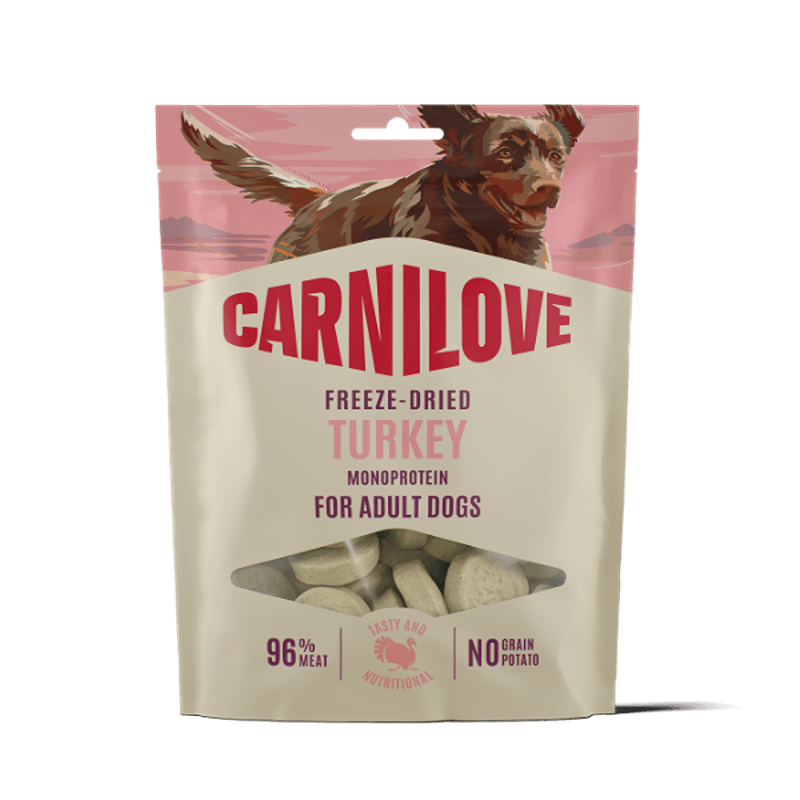 Carnilove Freeze-Dried Dog Treats Turkey 60g bag, featuring a happy dog on the packaging.
