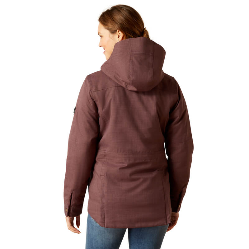Woman in an Ariat Sterling Insulated H2O Parka Raisin, smiling and looking to the side.