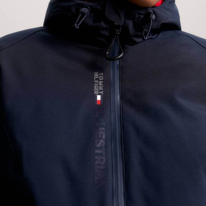 Close-up of the Tommy Hilfiger London Winter Riding Jacket Desert Sky with front logo zipper.