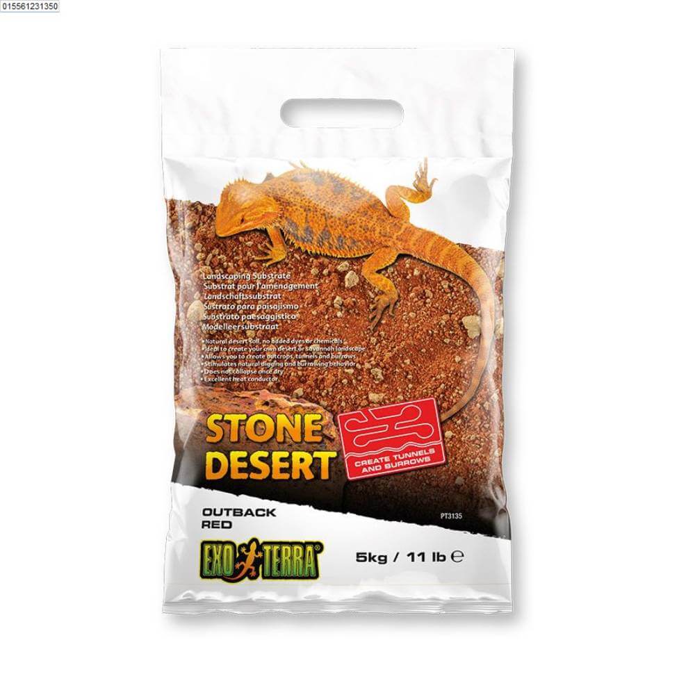 Exo Terra Red Stone Desert Substrate bag on reddish-brown soil.