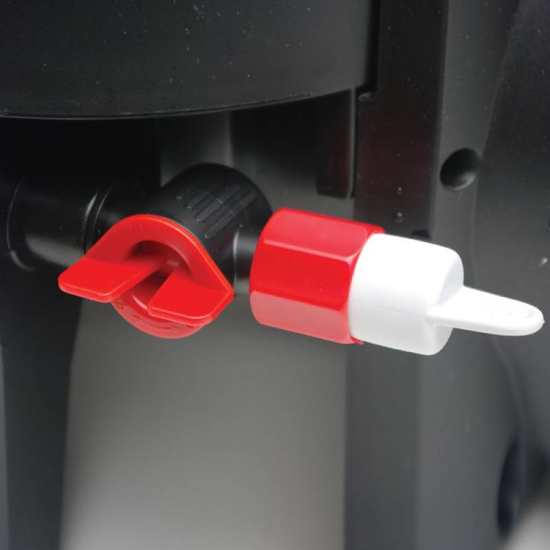 Close-up of two Fluval FX5/FX6 Purge Valves on a dark surface.