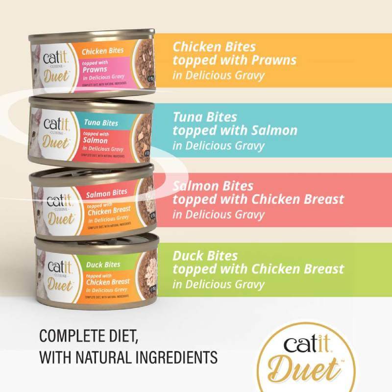 Four Catit Cuisine Duets grain-free cat food cans in assorted flavors stacked neatly.
