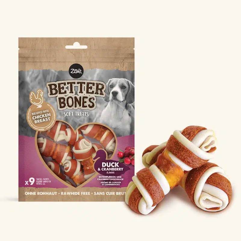 Zeus Zoe Better Bones Chicken Wrapped Duck &amp; Cranberry Small Bones 9pk with two treats beside.