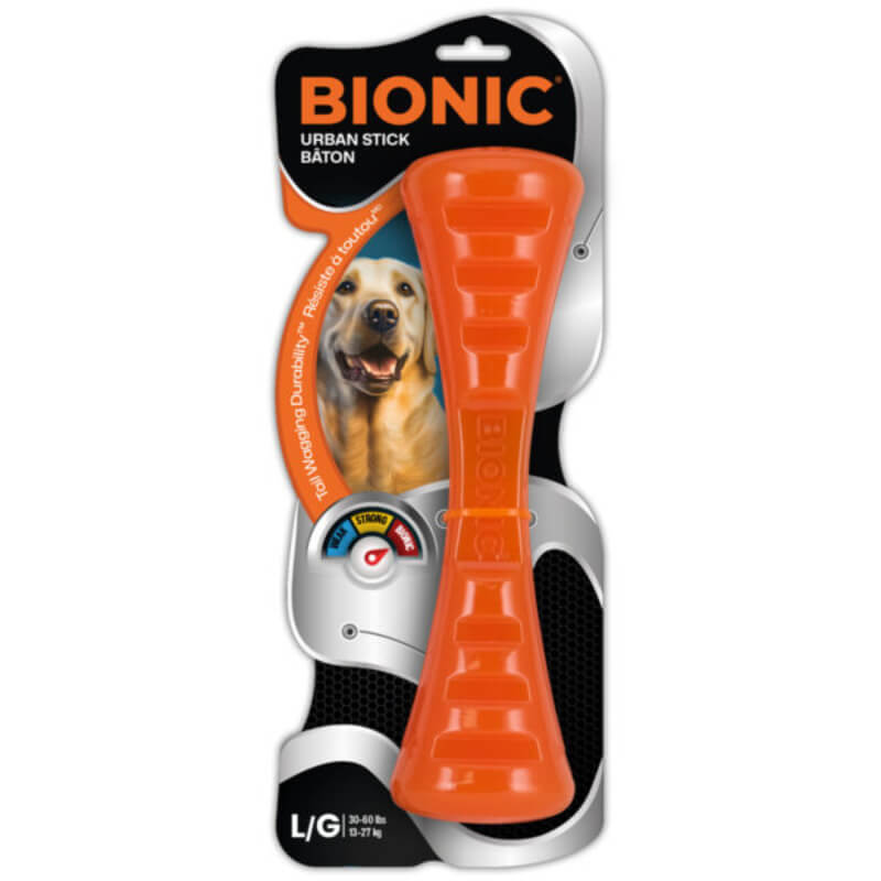 Bionic Urban Stick dog chew toy in packaging with a smiling dog.