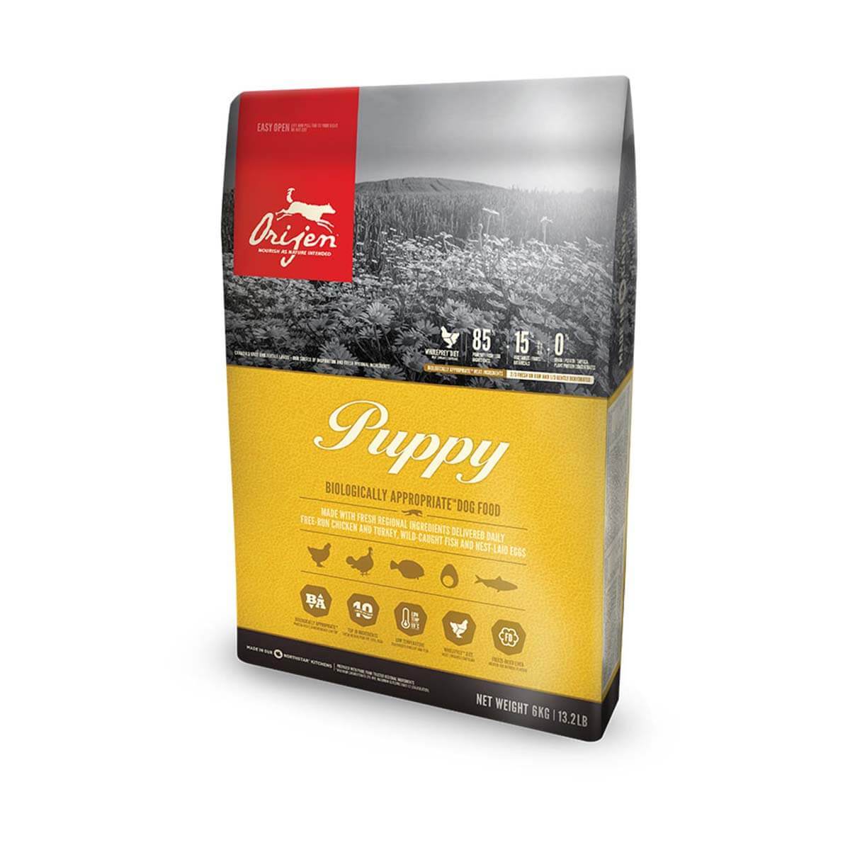 Orijen Puppy dog food, high protein, yellow label, 6kg bag with ingredients pictured on front.