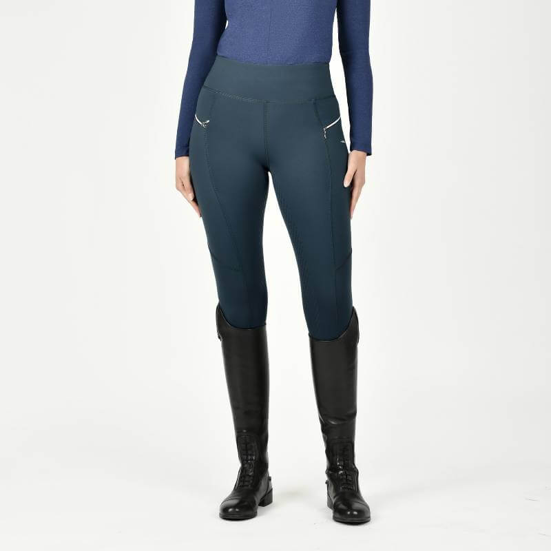 Person in Weatherbeeta Veda Technical Tights and long-sleeve top, front view.