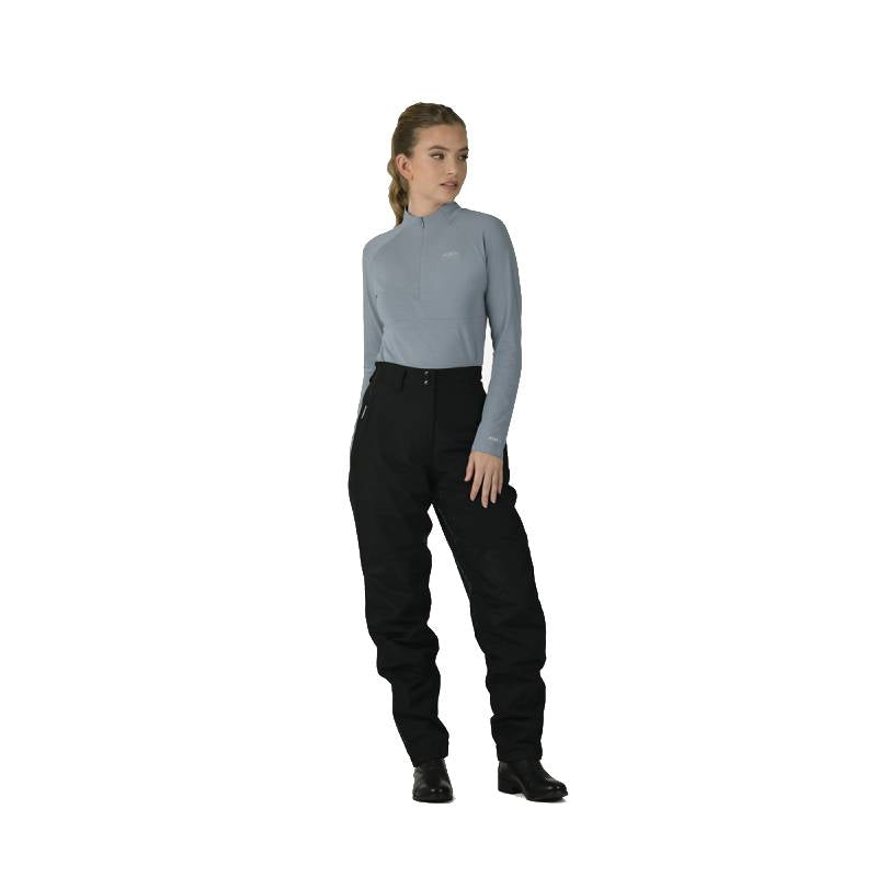 Woman in a gray long-sleeve top and black/white Weatherbeeta Rayne Waterproof Overtrousers II.
