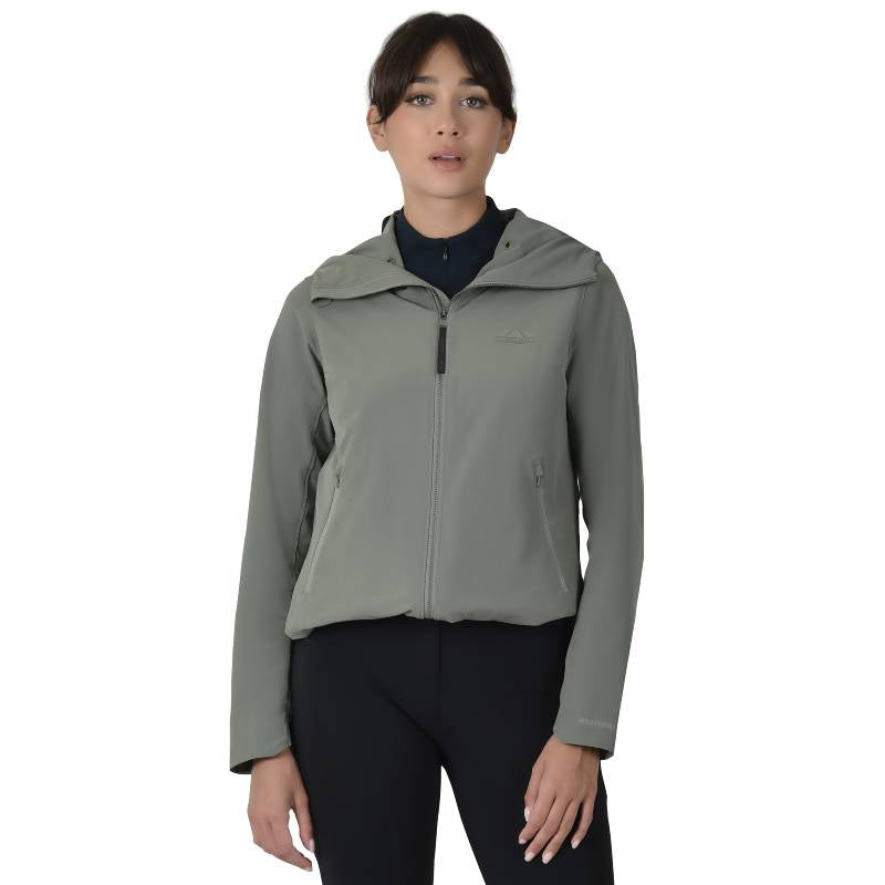 Woman in Weatherbeeta Abrasion Proof Stretch Riding Jacket Olive Leaf, against white background.