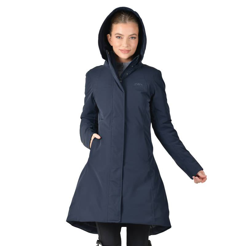Woman wearing a Weatherbeeta All Purpose Waterproof Longline Equestrian Jacket in navy.