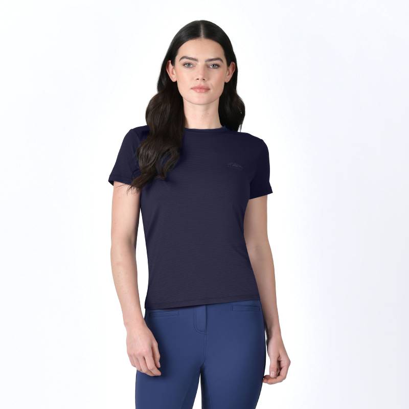 Woman with long dark hair wearing a Weatherbeeta Relaxed UV Tee Navy, standing against white background.