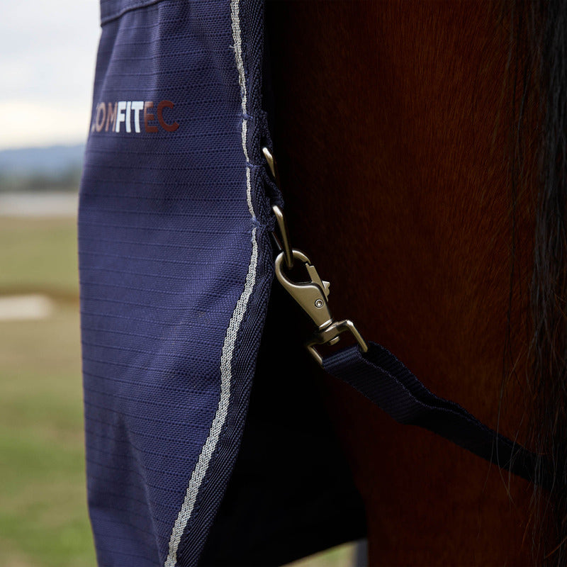 Close-up of a horse in a Weatherbeeta Comfitec Prelim Combo Neck Navy Embossed Plaid rug.