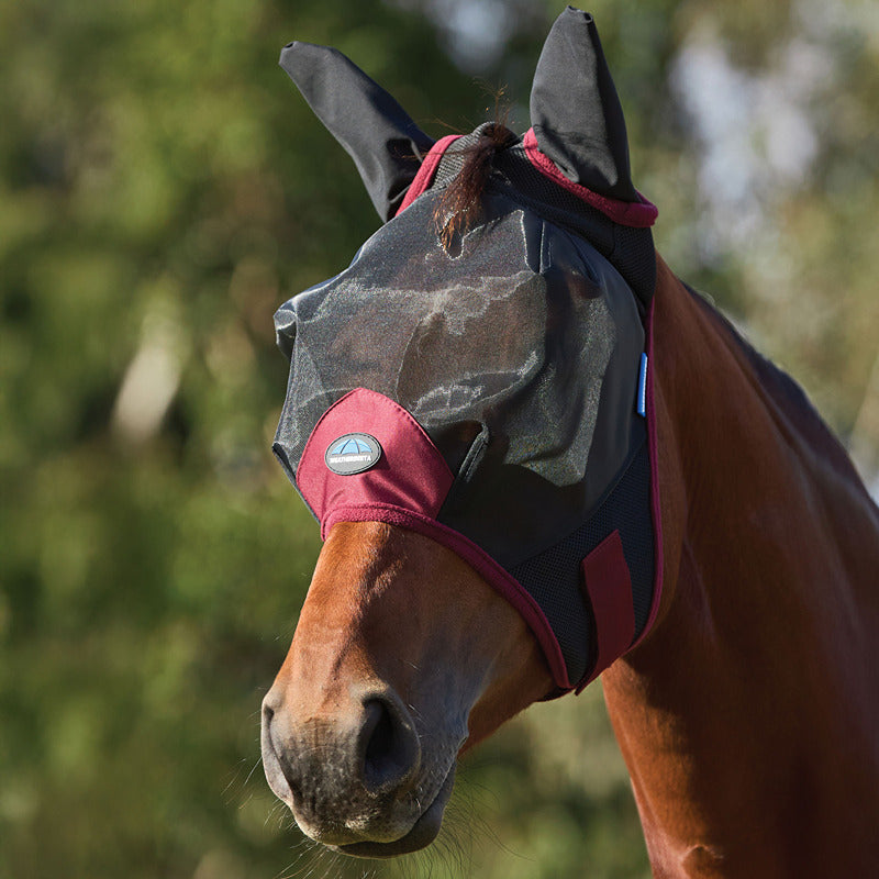 Brown horse outdoors in Weatherbeeta Comfitec Fine Mesh Fly Mask w/ Ears Black/Burgundy.