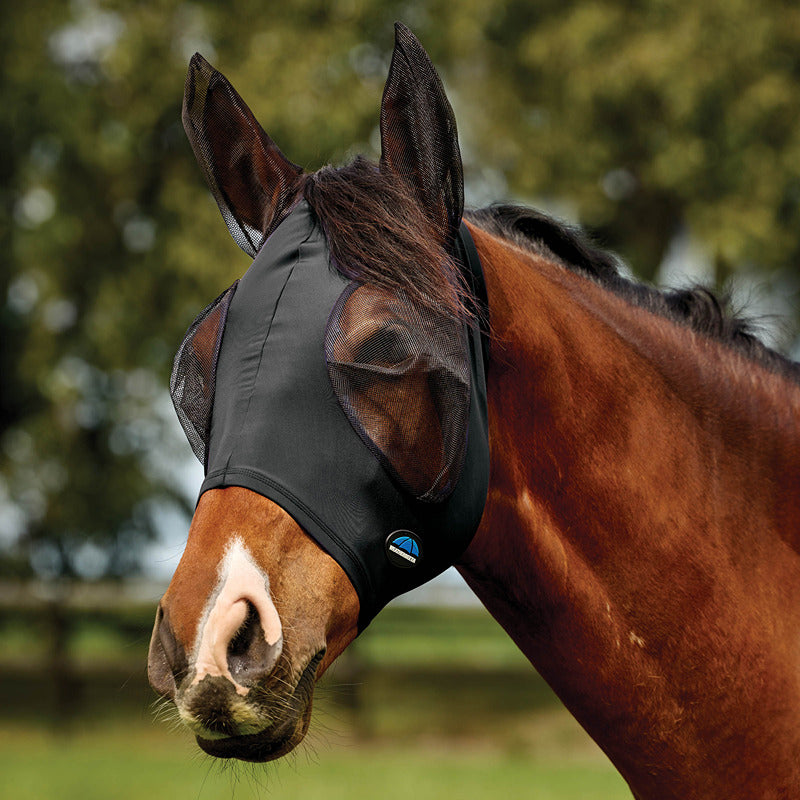 Brown horse wears Weatherbeeta Comfitec Deluxe Stretch Fly Mask With Ears Black/Black outdoors.