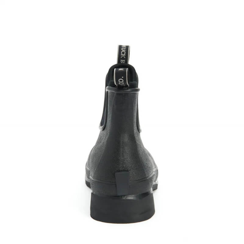 Muckboot Wear Ankle Boots Black: waterproof, textured, with pull tab, shown from the back.