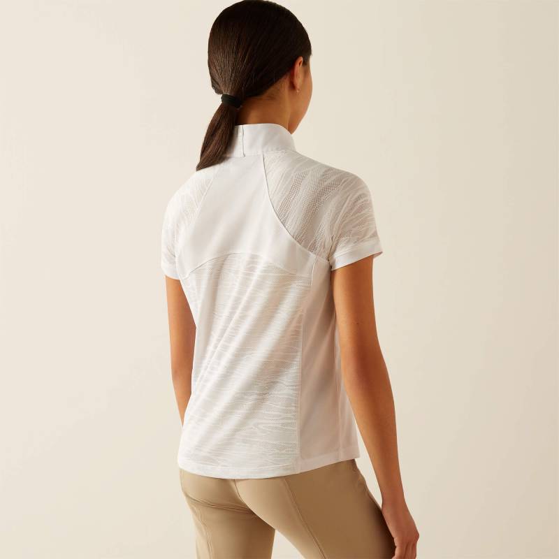 Girl with long brown hair in ponytail wearing Ariat Youth Aptos Vent 2.0 SS Show Shirt in white.