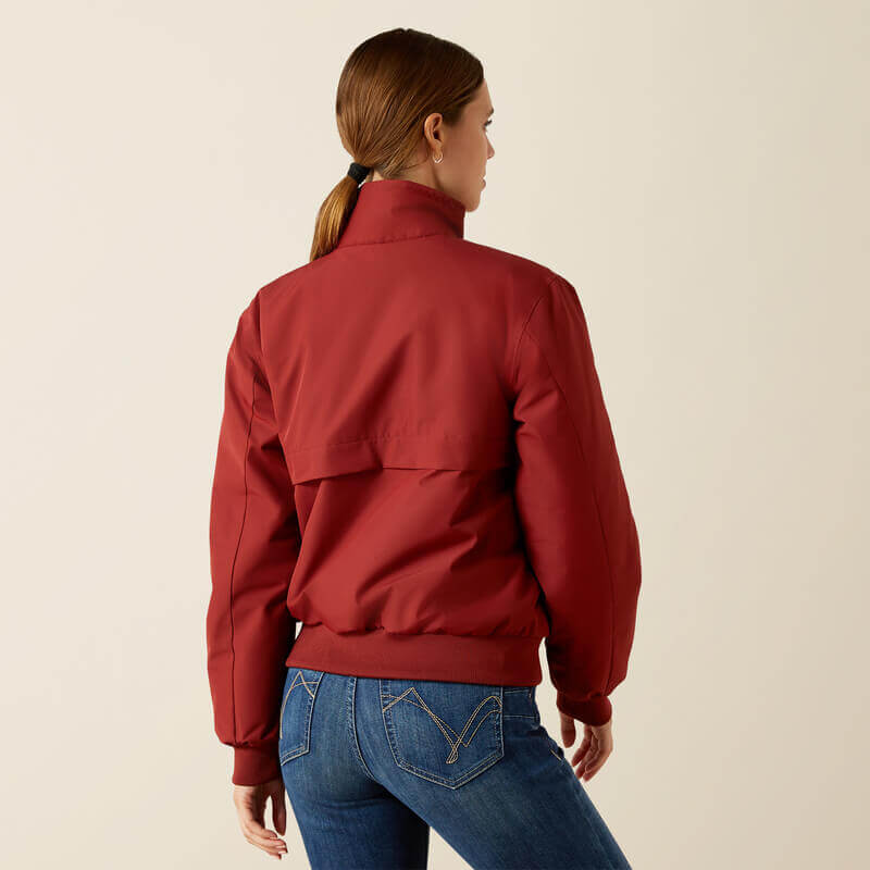 Woman wearing an Ariat Womens Stable 2.0 Insulated Jacket in Madder Brown.