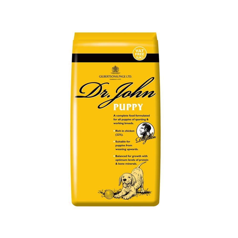 Dr John Puppy 10kg bag with chicken, omega 6 &amp; 3; features a puppy lying down.