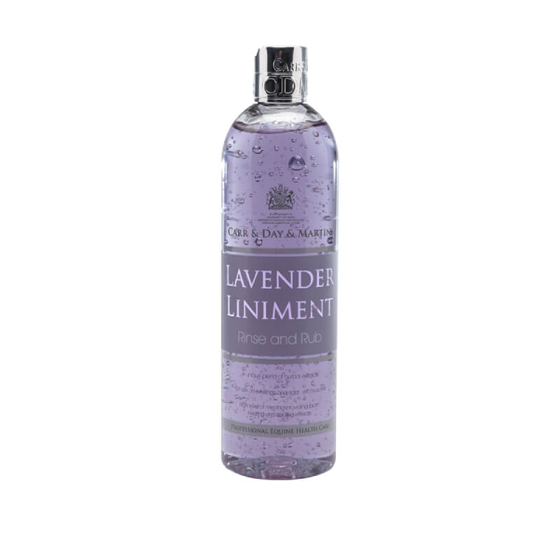 Clear bottle of Carr Day Martin Liniment 500ml, filled with purple liquid.