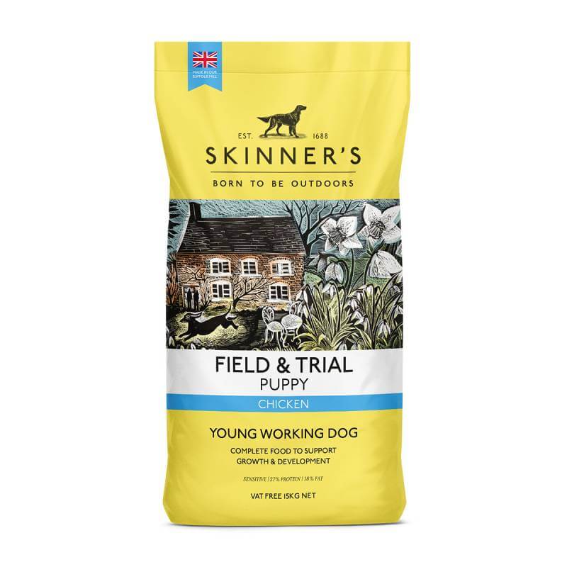 Skinners Field &amp; Trial Puppy dog food bag with farmhouse and playful puppy illustration.