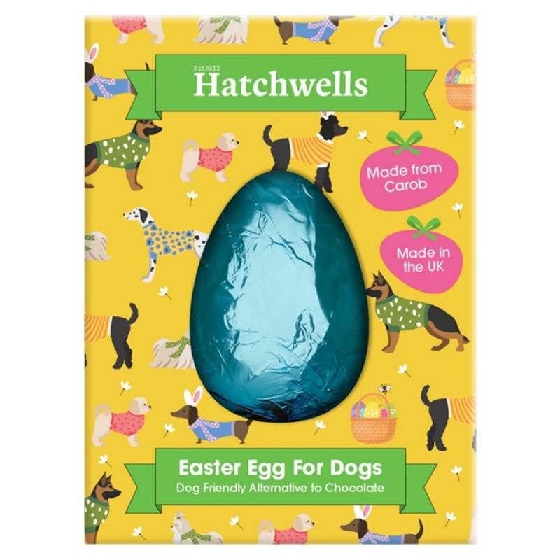 Hatchwells Easter Egg for Dogs 60g, a carob treat in yellow box with illustrated dogs.