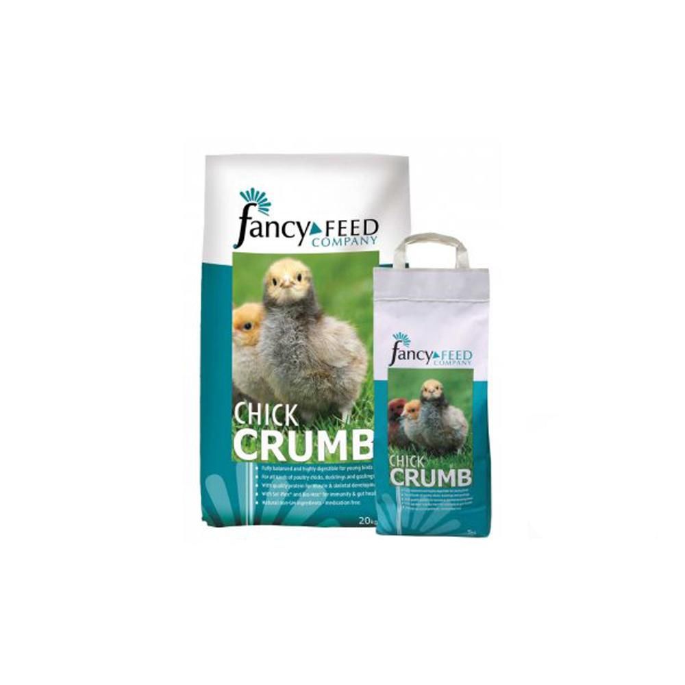 Two bags of Fancy Feeds Chick Crumbs offer quality protein for a balanced poultry diet.