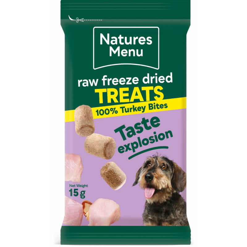 Green pack of Natures Menu Freeze Dried Meat Bites 15g with dog photo and treat pieces shown.